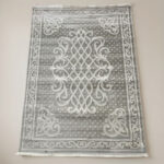 A beautiful home and guest carpet makes your home feel cozy and look great. It has a neat, matching pattern in the middle. It is made from strong, soft fabric that feels nice on your feet and is very easy to clean.
