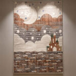 A premium-grade kids' rug featuring a highly durable, high-quality build that withstands constant activity. The pile is tightly woven to be incredibly soft and smooth, creating a comfortable surface for toys and games. The design showcases a weathered abstract center in neutral tones, finished with a clean geometric frame.