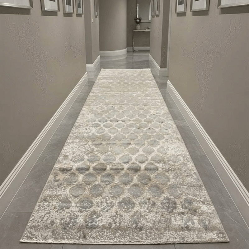 Showcases rich, intricate tribal patterns woven into a low-profile construction, making it perfect for smooth door clearance in entryways.