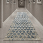 Showcases rich, intricate tribal patterns woven into a low-profile construction, making it perfect for smooth door clearance in entryways.