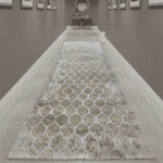 Showcases rich, intricate tribal patterns woven into a low-profile construction, making it perfect for smooth door clearance in entryways.