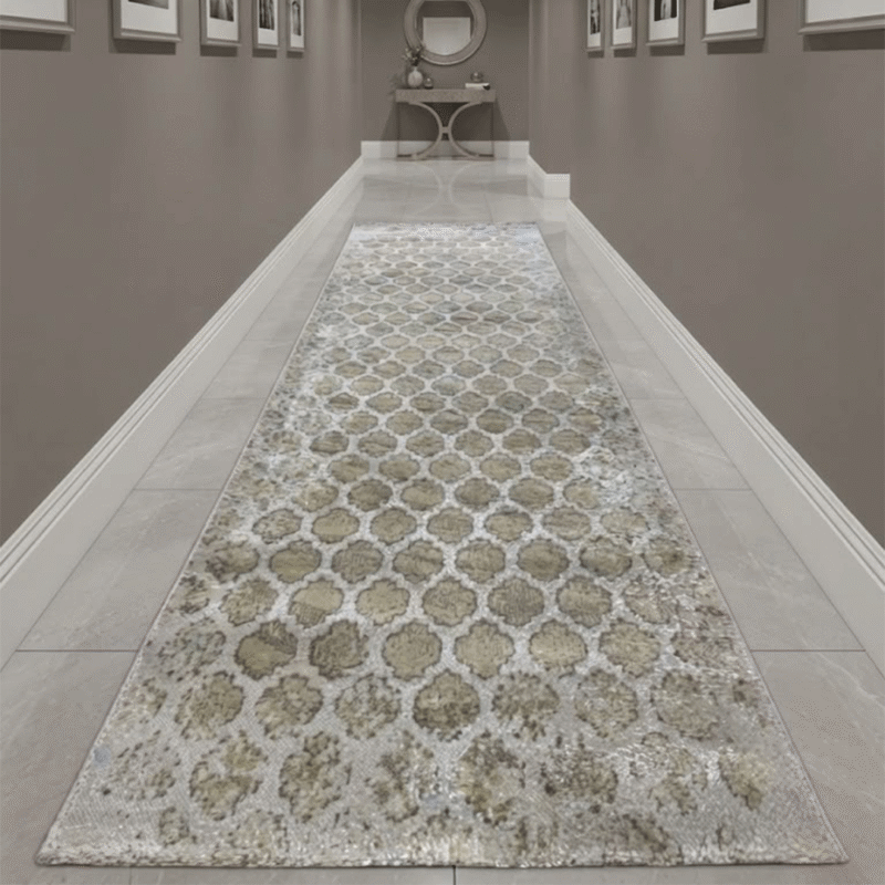 Showcases rich, intricate tribal patterns woven into a low-profile construction, making it perfect for smooth door clearance in entryways.