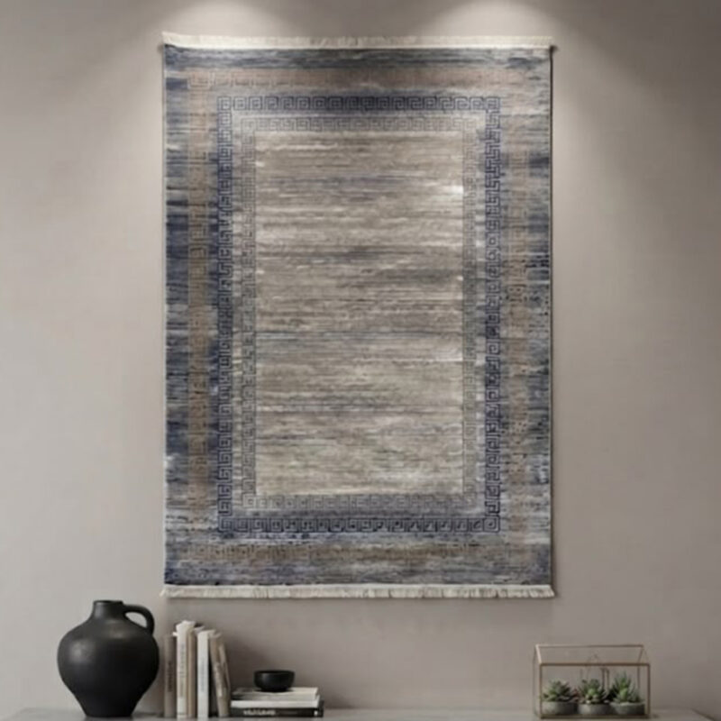This soft-textured area rug combines a clean, neutral look with a distressed abstract design. Its smooth pile offers a premium feel underfoot while looking sharp on any floor.